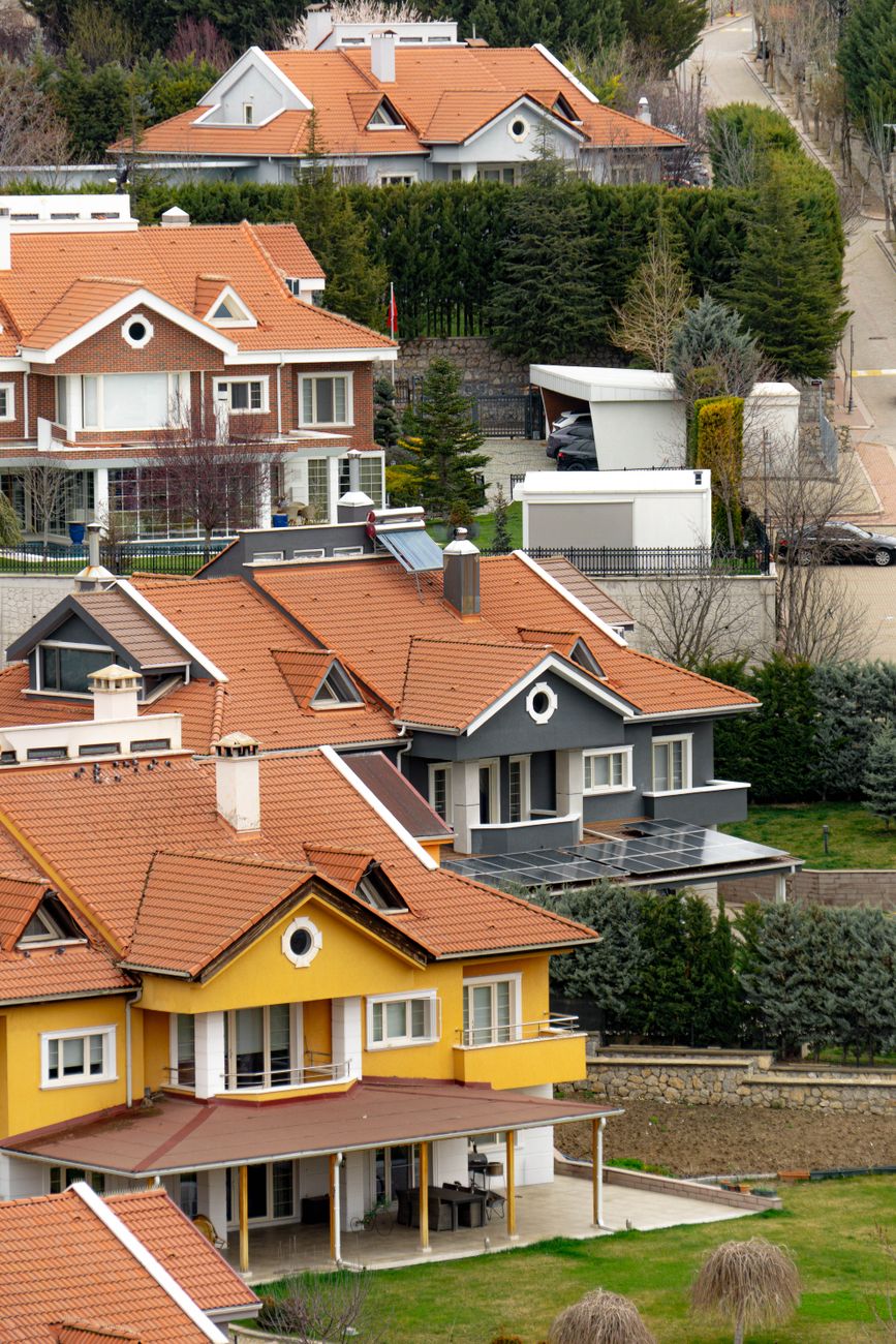 modern residential houses with red roofs in ankara